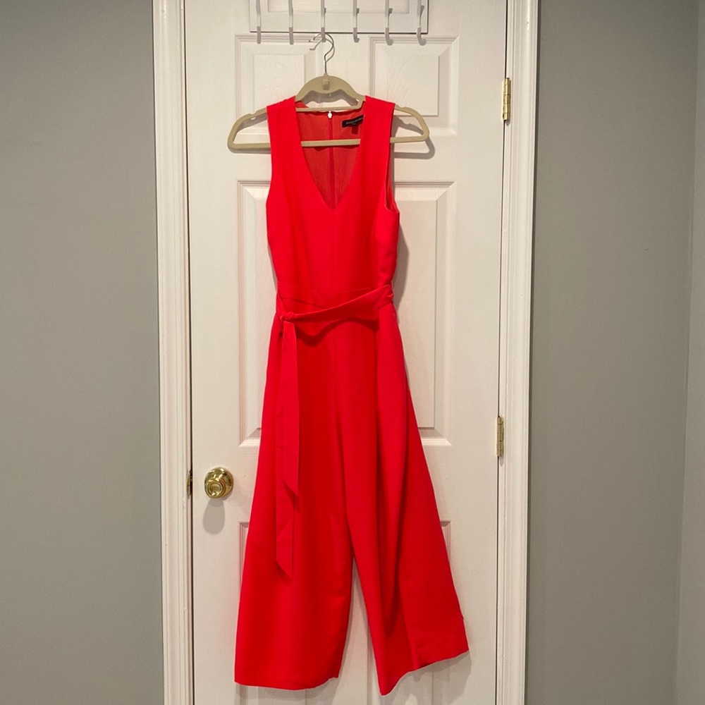 Pink jumpsuit with front pockets and adjustable belt - Size 4 - Only worn once!